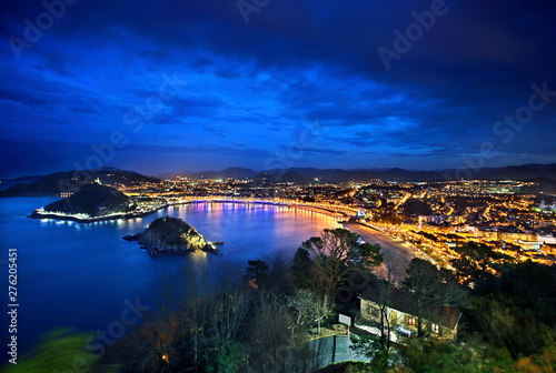 Panoramic view of San Sebastian - Donostia from Monte Igueldo. From right to left you can see, Ondarreta beach, La Concha beach and Santa Clara islet. photo