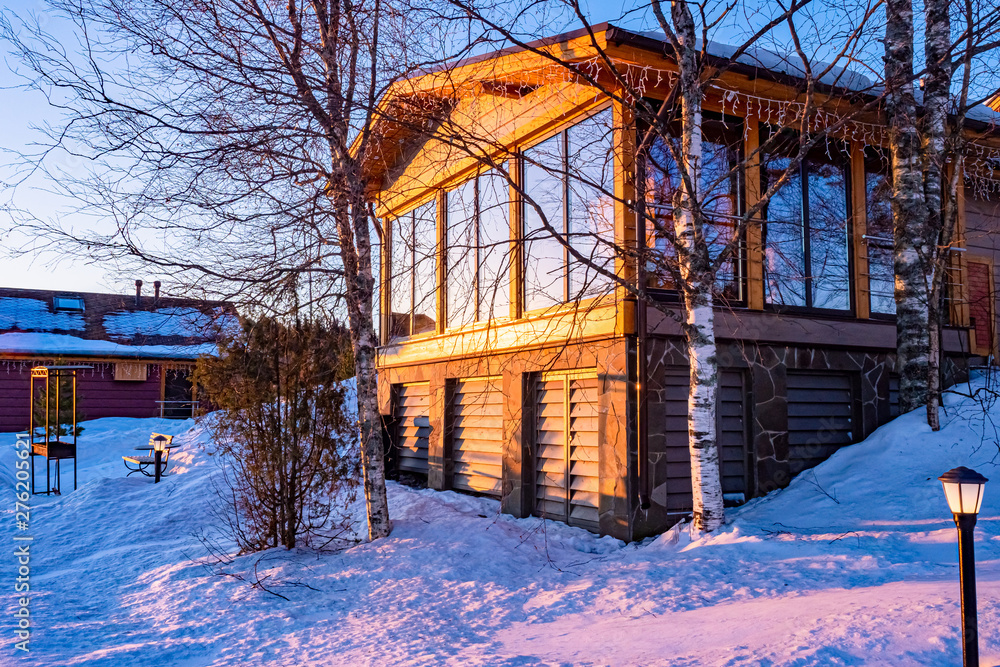 Sunlit winter cottage in Karelia. Winter villa near the forest. Karelian house with barbecue area. New year rest in Karelia. Cottage for rest weekend. Rent a cottage in Karelia for Christmas holidays.