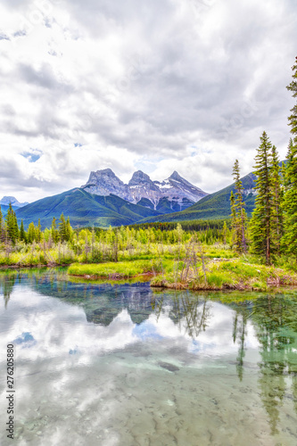 Three Sisters Mountain Peaks in the Canadian Rockies of Canmore, Alberta, Canada © ronniechua