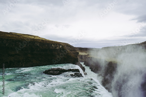 The edge of the Gullfoss waterfall and splashes flying over it