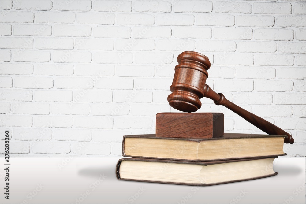 Justice Scales and books and wooden gavel on table. Justice concept Justice Scales and books and wooden gavel on table. Justice concept