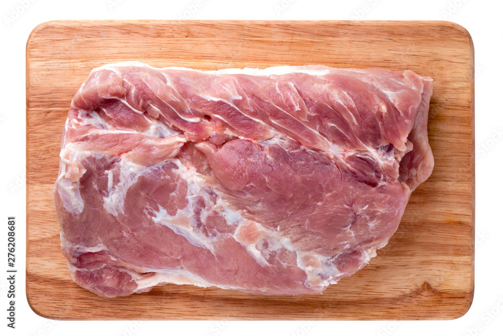 A piece of meat on a white background. Raw piece of pork on a wooden board. A piece of meat on a white background. Raw piece of pork on a wooden board.