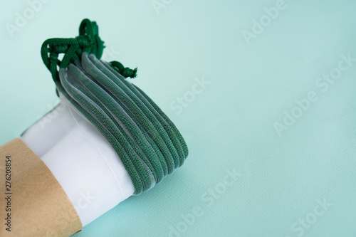 mock-up bundle white transparent weaving kapron bags for repeated use when buying and storing fruits and vegetables on a blue background corner composition photo