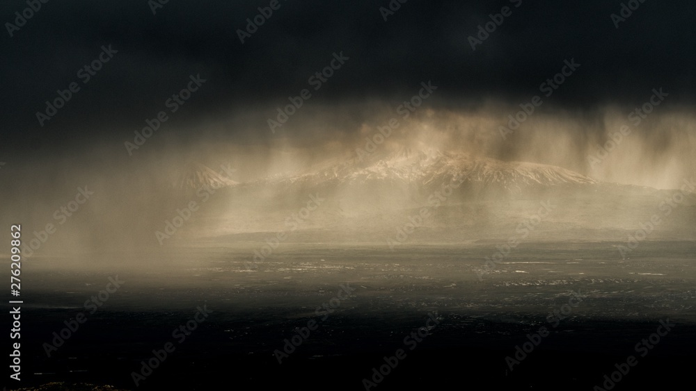 Storm in the mountains. Rain and dark clouds over Mount Ararat. Turkey Storm in the mountains. Rain and dark clouds over Mount Ararat. Turkey