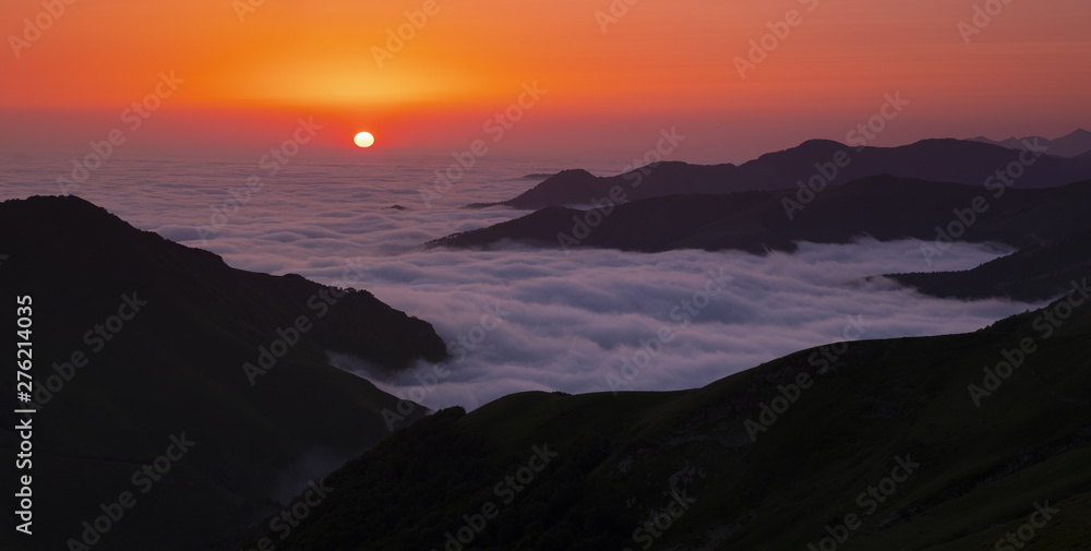 sunrise with sea of clouds in the Pyrenees mountain range