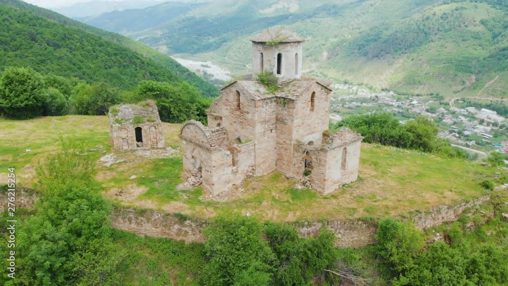 Aerial view An ancient partially destroyed Christian church of the tenth century AD in the Caucasian mountains of the Republic of Karachay-Cherkessia Aerial view An ancient partially destroyed Christian church of the tenth century AD in the Caucasian mountains of the Republic of Karachay-Cherkessia