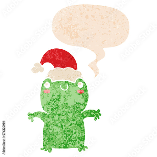 cute cartoon frog wearing christmas hat and speech bubble in retro textured style
