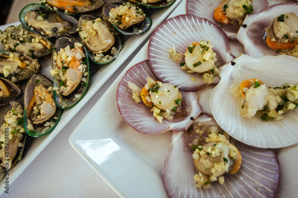 Scallops and mussels on a buffet table Scallops and mussels on a buffet table