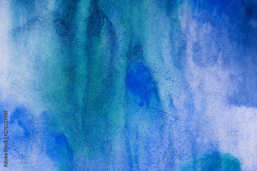 abstract watercolor background sheet of paper covered with multicolored paint blue, grunge effect background for design with texture