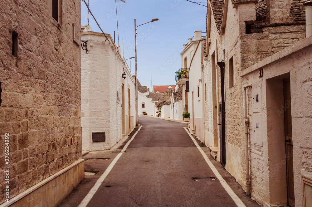 Spectacular narrow street between ancient buildings