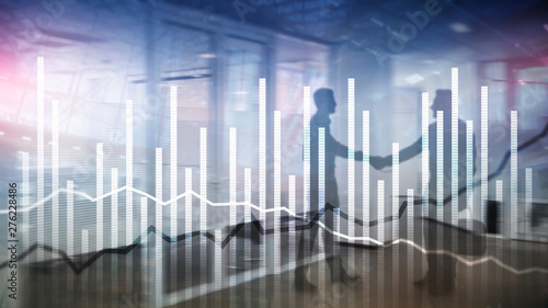 Double exposure Economics growth diagrams on blurred background. Business and investment concept