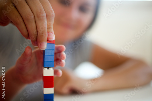Plastic building blocks isolated on white background.-Concept-a game for developing brain motor skills