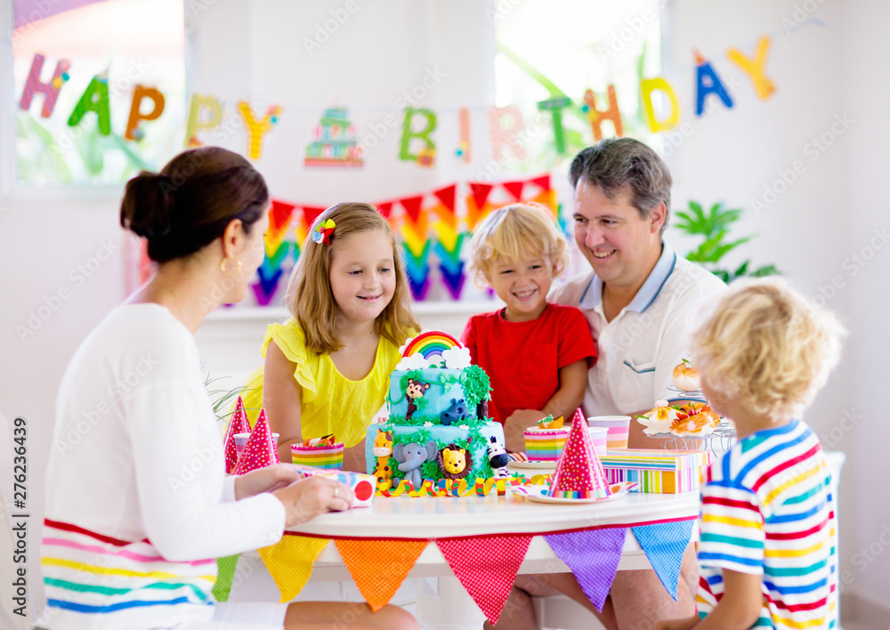 Child birthday party cake. Family with kids. Child birthday party cake. Family with kids.