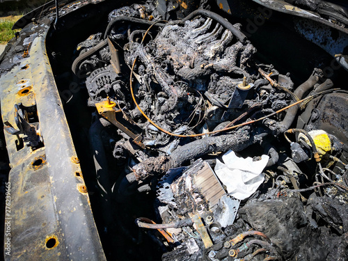 An abandoned, stolen burned out car