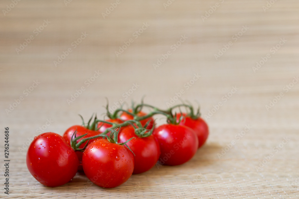 Tomato branch , fresh harvest from garden Tomato branch , fresh harvest from garden