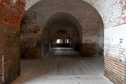 Arched walkways through a US Civil War confederate fort.