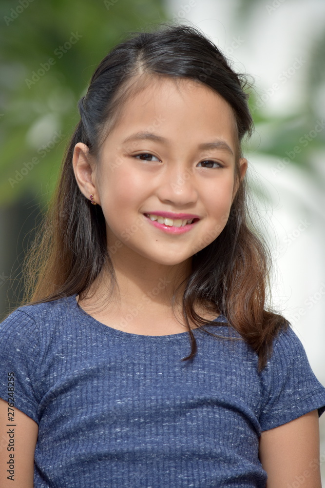 A Smiling Asian Female A Smiling Asian Female