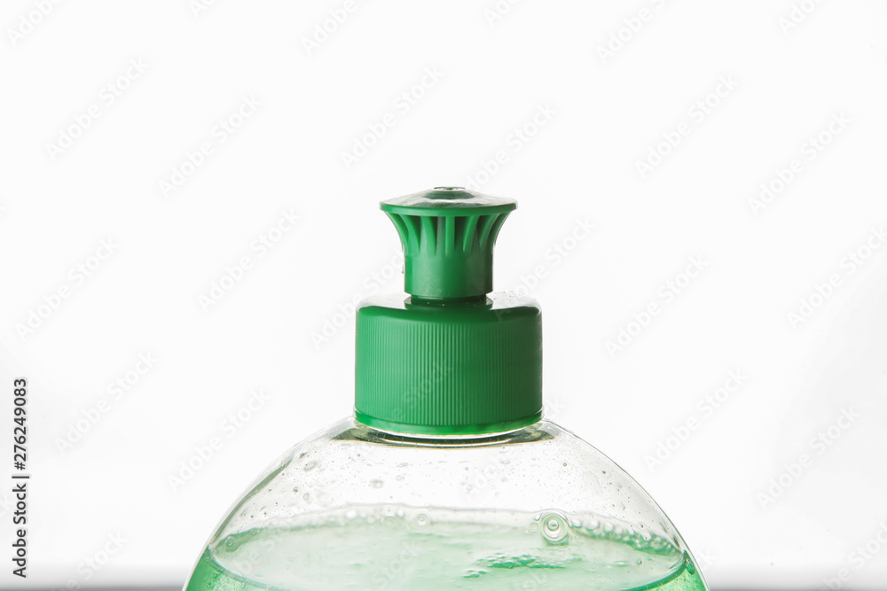 A bottle of dishwashing detergent A bottle of dishwashing detergent