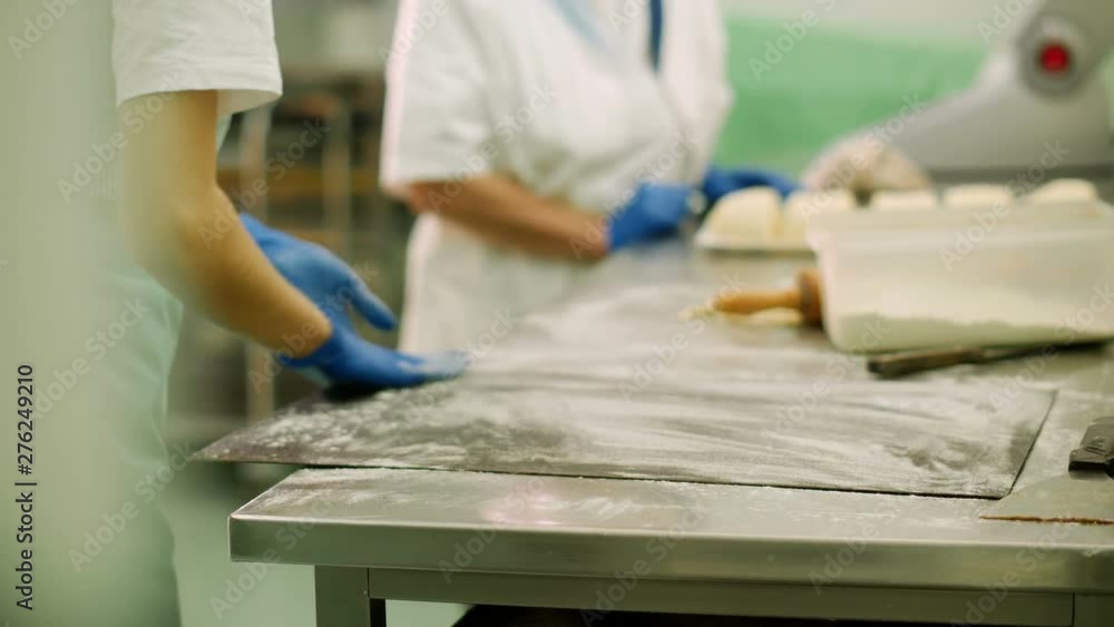 Chef preparing dough for croissants or bread Chef preparing dough for croissants or bread