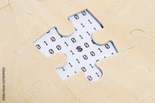 Digital technology with puzzles, currency symbols,dollar