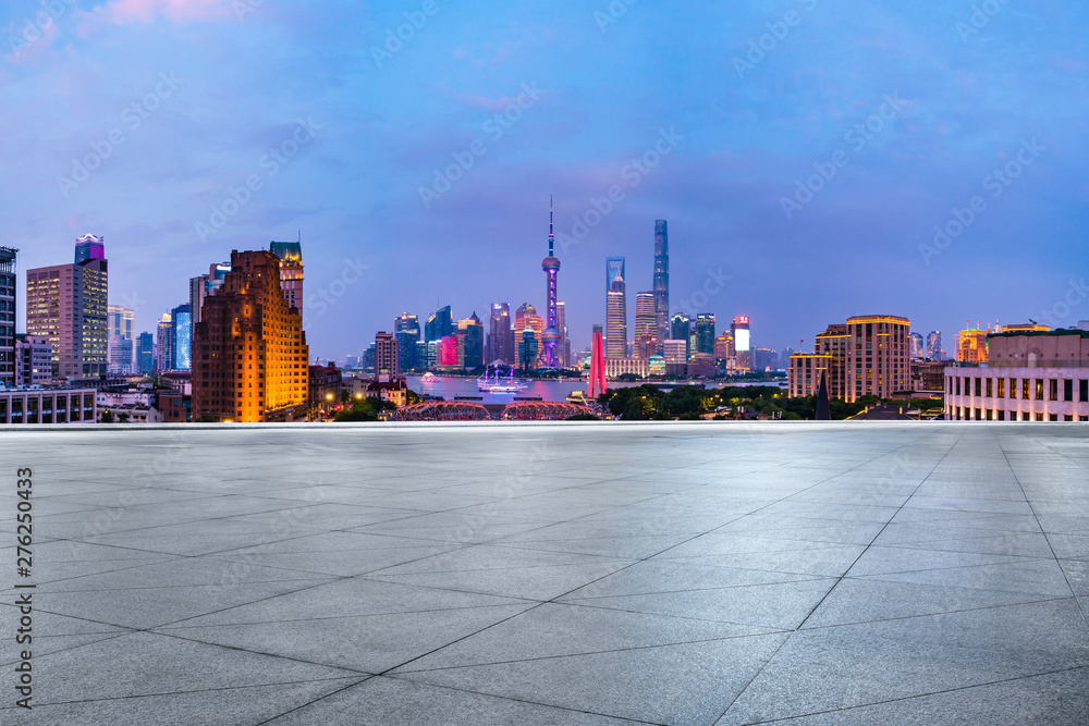 Shanghai skyline aerial panoramic view with empty square floor at night,China