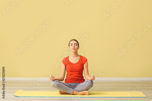 Beautiful woman practicing ...