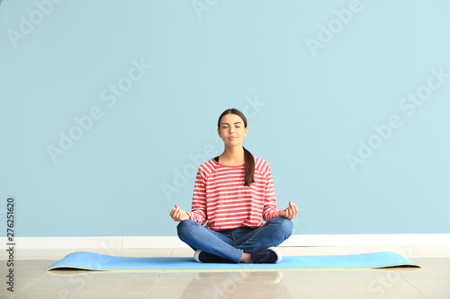 Beautiful woman practicing ...