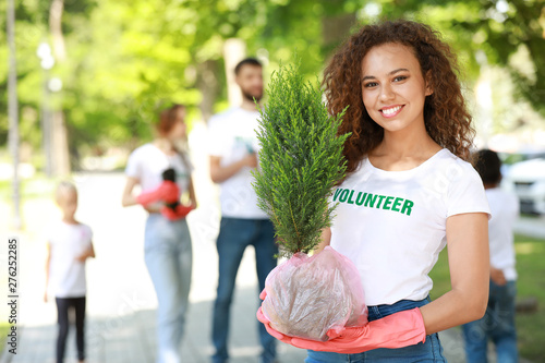 Female volunteer with young...