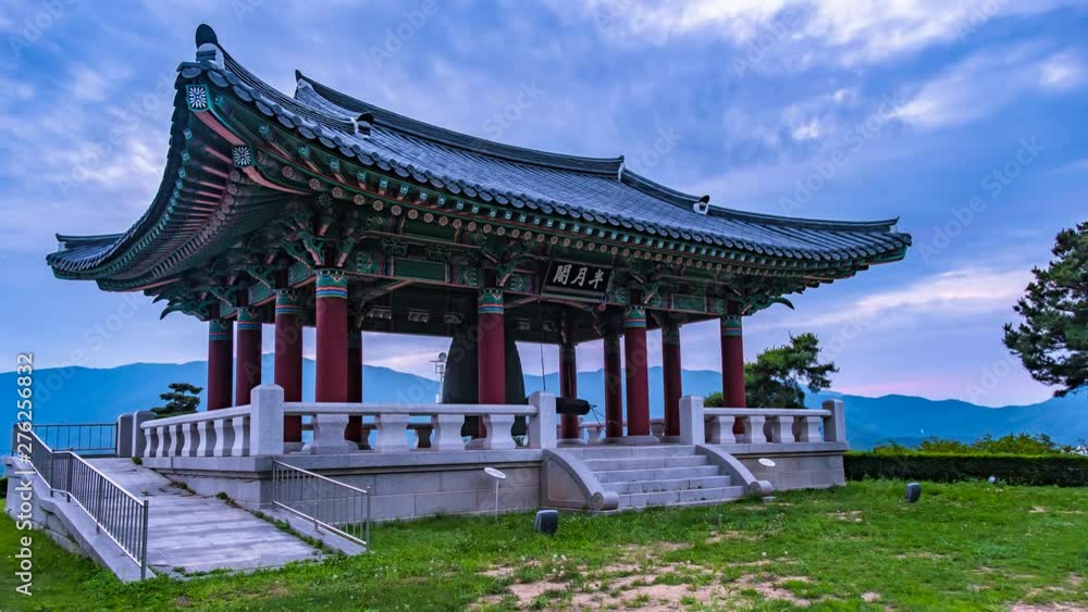 The sunset atmosphere, The park with old bells are stored in the pavilion Time lapse,Pocheon Seoul Korea.25 June 2019 The sunset atmosphere, The park with old bells are stored in the pavilion Time lapse,Pocheon Seoul Korea.25 June 2019