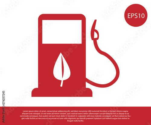 Red Bio fuel concept with fueling nozzle and leaf icon isolated on white background. Gas station with leaves. Eco refueling. Vector Illustration