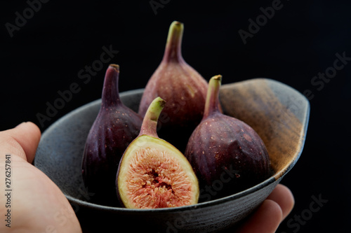 Holding plate with cut ripe figs