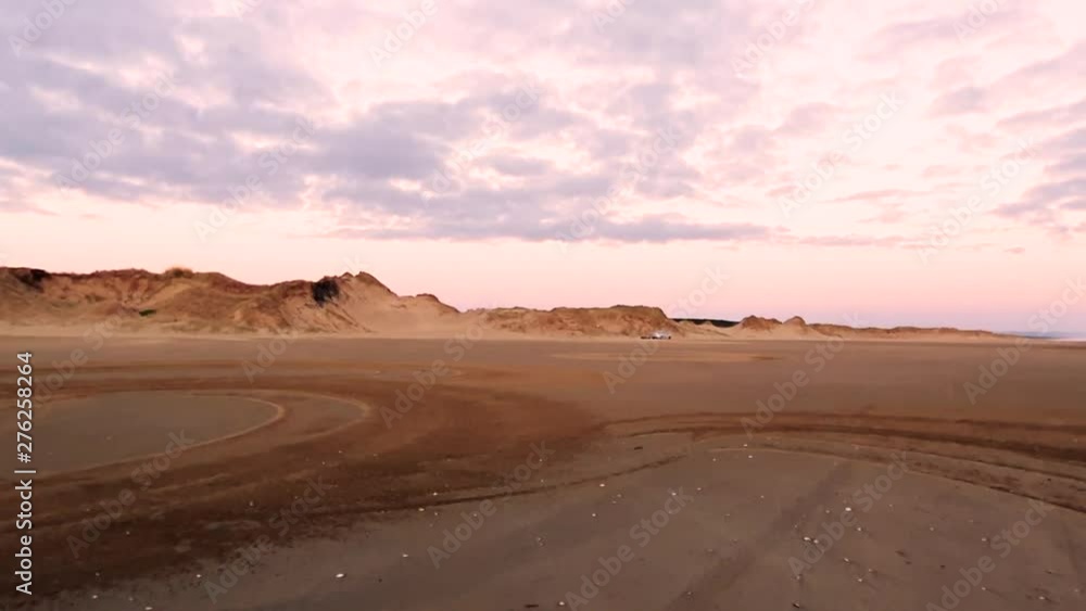 180 degree view at 90 mile beach New Zealand during sunset 180 degree view at 90 mile beach New Zealand during sunset