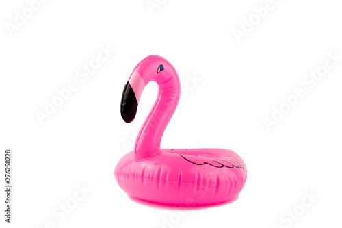 Giant inflatable pink flamingo on a white background. Pool float party. Summer concept.
