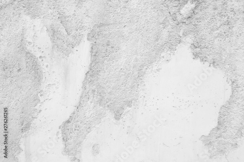 Dirty white cement wall background.