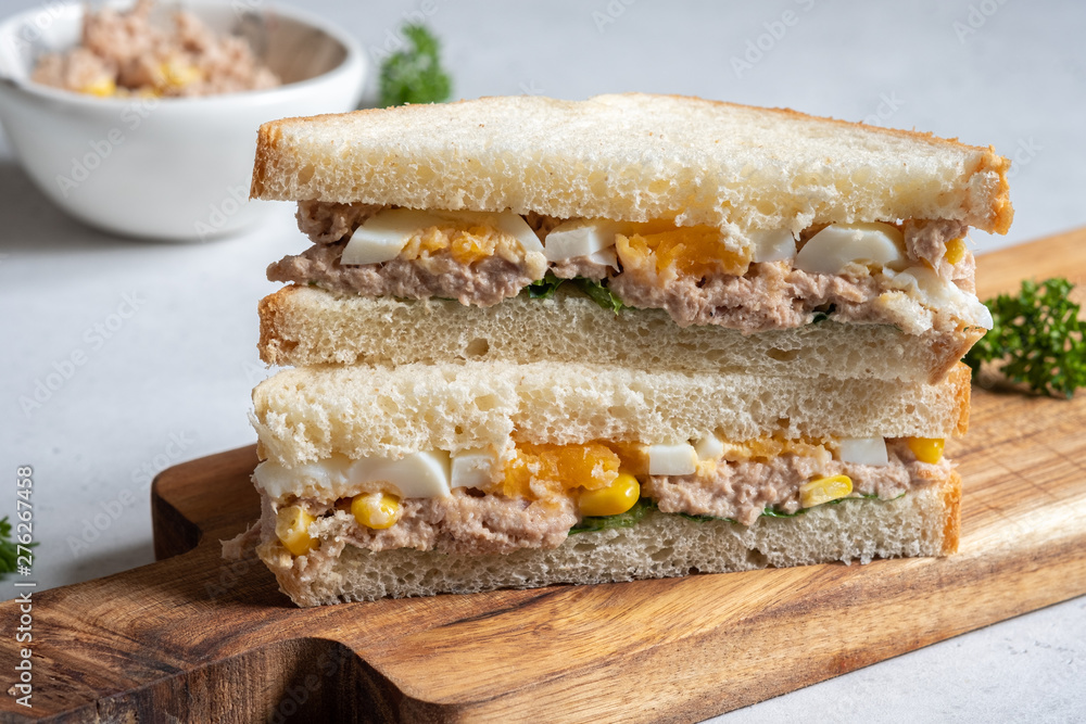 Tuna fish sandwich with egg and corn