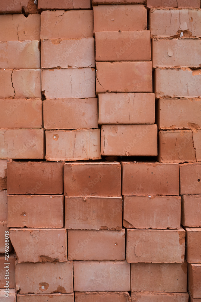 Obraz premium The piled red bricks