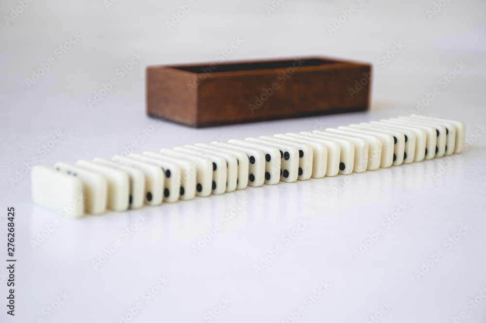 Domino on white background with box Domino on white background with box