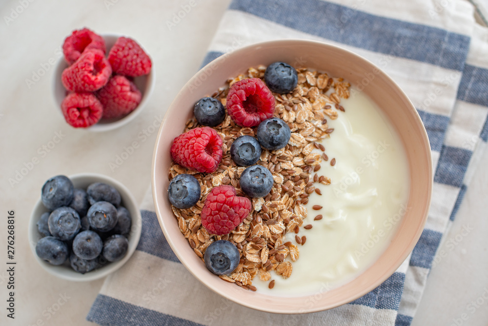 Granola with yogurt and berries for healthy breakfast Granola with yogurt and berries for healthy breakfast