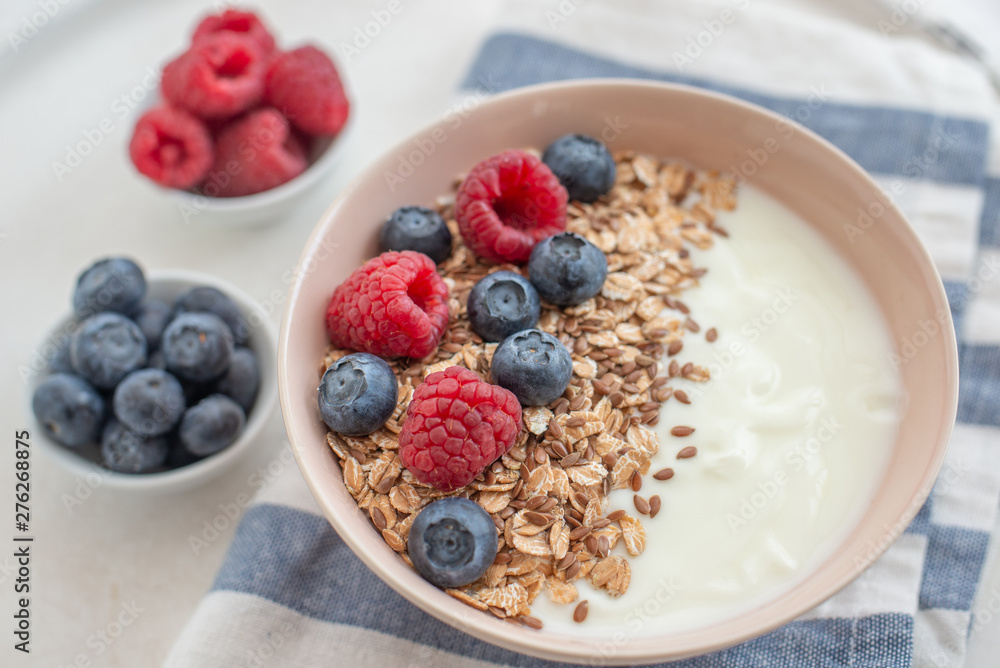 Granola with yogurt and berries for healthy breakfast Granola with yogurt and berries for healthy breakfast