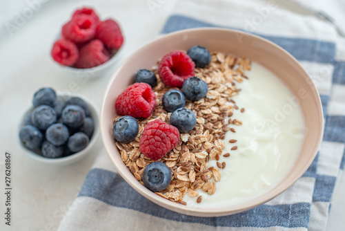 Granola with yogurt and berries for healthy breakfast