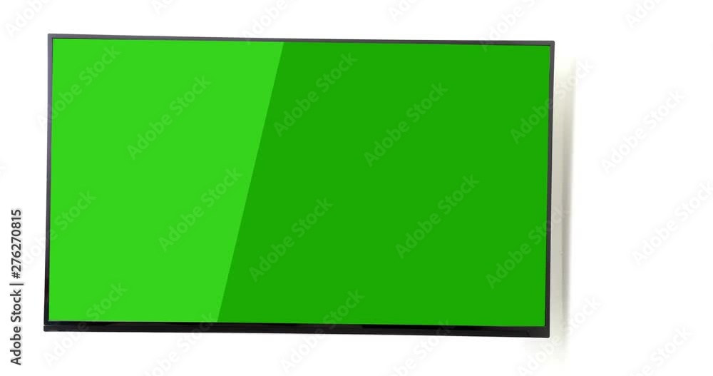 TV on a white wall moving with a green screen TV on a white wall moving with a green screen