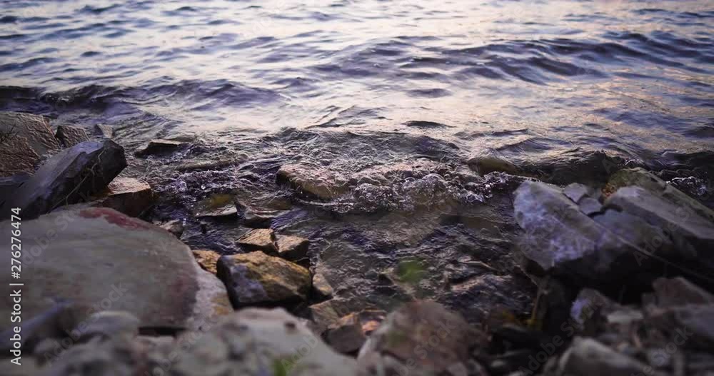 Lake Cachuma, California, USA timelapse of the water of the lake gently splashing rocky shore, trucking left shot Lake Cachuma, California, USA timelapse of the water of the lake gently splashing rocky shore, trucking left shot
