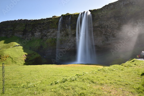 The beautiful Seljalandsfoss waterfall in the south of Iceland photo