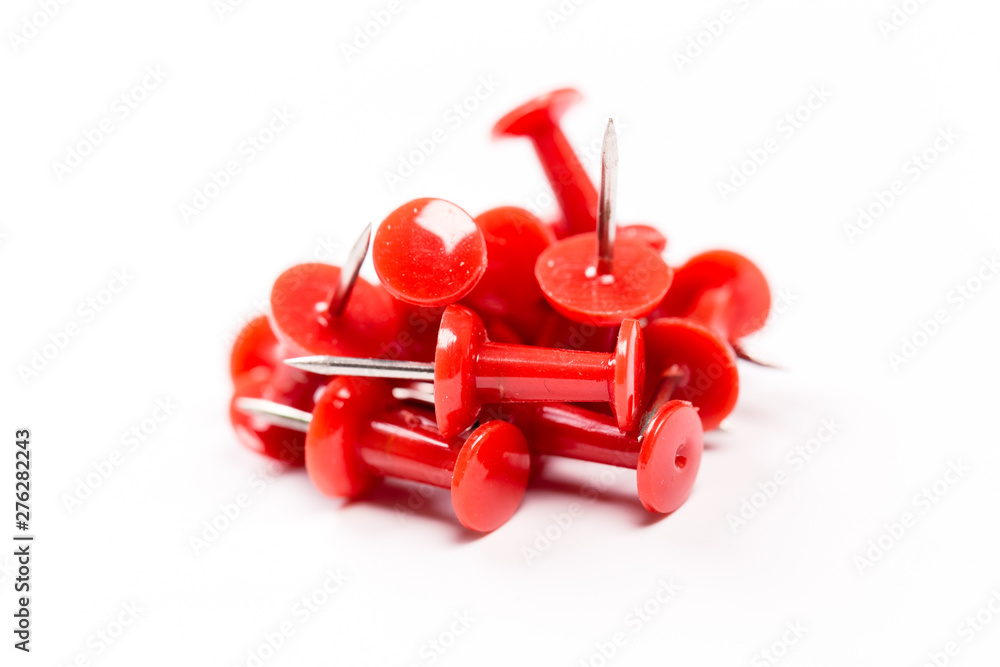 Push red pins isolated on white background. Push red pins isolated on white background.