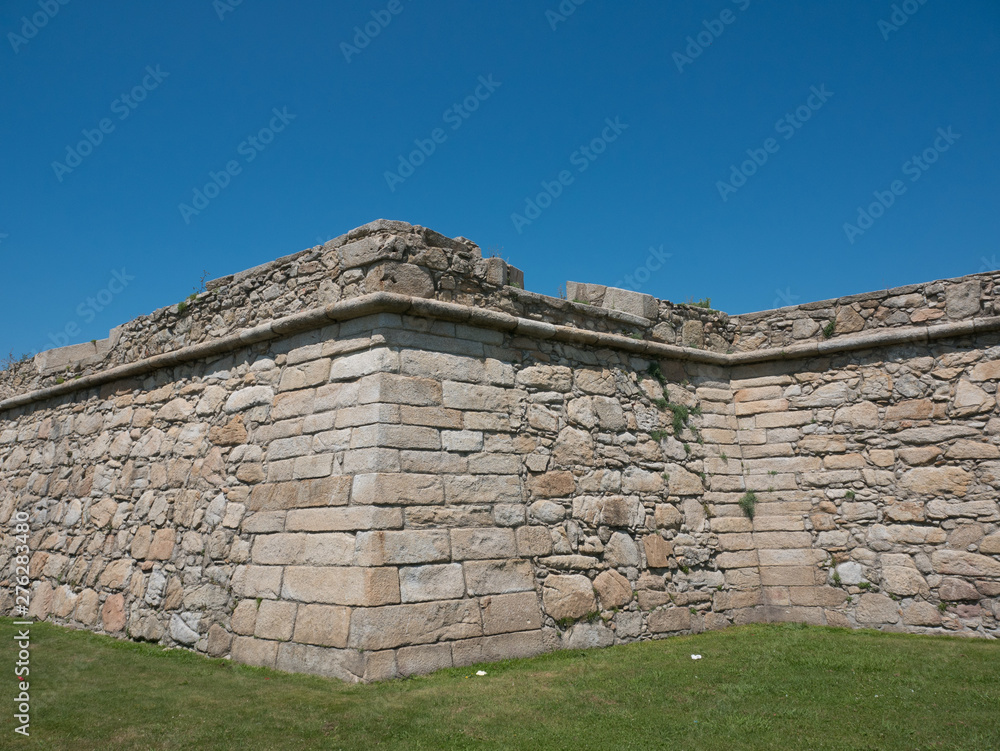 Exterior stone wall of historic old fort in Povoa de Varzim, Porto district, Portugal, built in 1701
