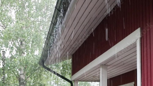 rain drop down on eaves in rainy day