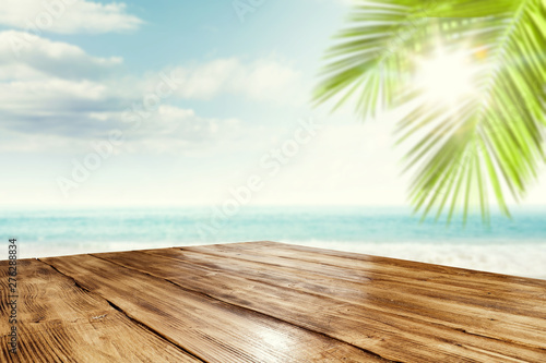 Desk of free space and summer beach landscape with sea 