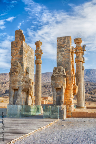 The majestic Gate of All Nation, Persepolis. Iran is the capital of the Achaemenids. The ancient city of the Persians. Bright majestic monuments. Blue sky and clouds background.