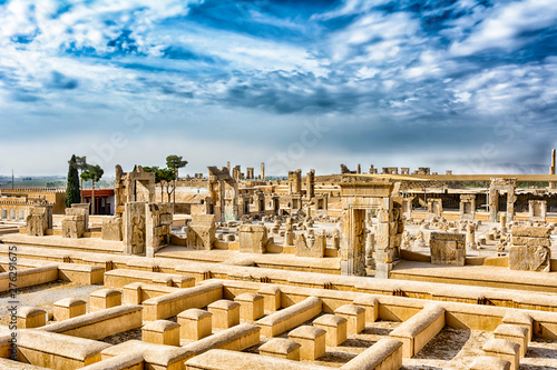 Persepolis Iran is the capital of the Achaemenids. The ancient city of the Persians. Bright majestic monuments. Blue sky and clouds background.