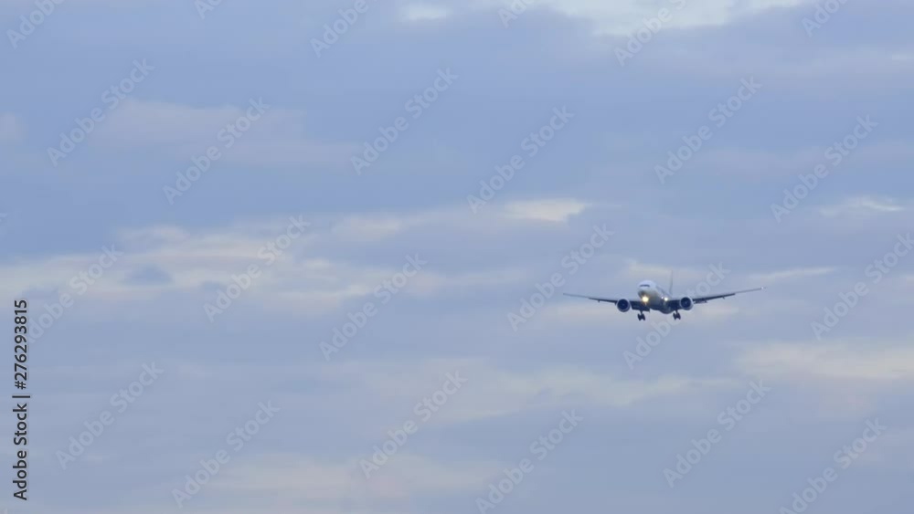 plane flying against the background blue sky with clouds. plane flying against the background blue sky with clouds.